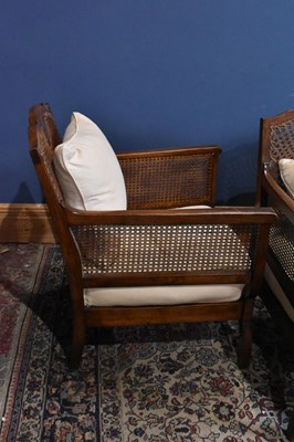 Lot 47 - An early 20th century three piece Bergere suite.