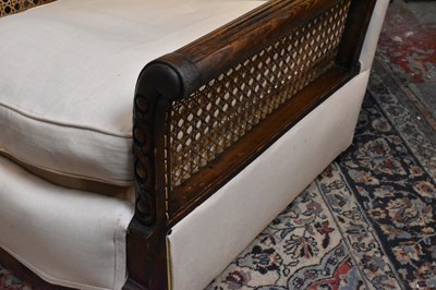 Lot 48 - A three piece Bergere suite with cream...
