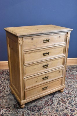 Lot 286 - An old pine chest of five drawers on bun feet,...