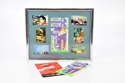 Lot 2396 - AYRTON SENNA; a collage of telephone cards...