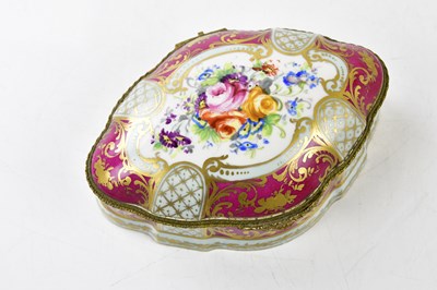 Lot 1412 - A modern porcelain trinket box of shaped oval...