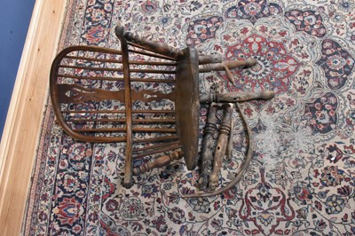 Lot 147 - A 19th century elm Windsor elbow chair for...