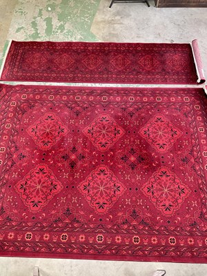 Lot 595 - Two Afghan rugs, the rug 215 x 305cm, the...