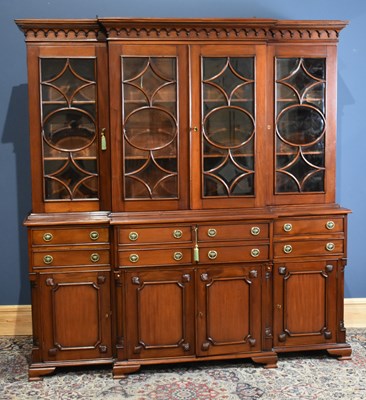 Lot 173 - A reproduction mahogany breakfront bookcase,...