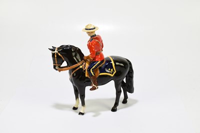 Lot 570 - BESWICK; a model of a Canadian Mounted...