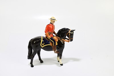 Lot 570 - BESWICK; a model of a Canadian Mounted...