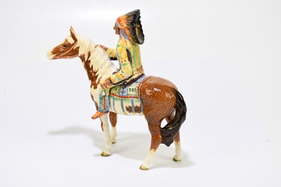 Lot 571 - BESWICK; a model of a Native American on...