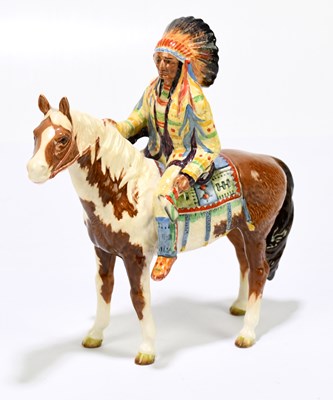 Lot 571 - BESWICK; a model of a Native American on...