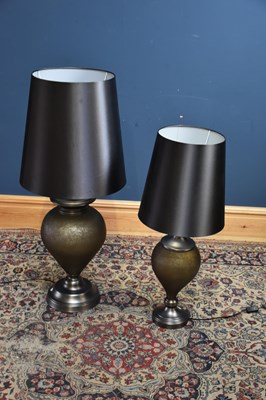 Lot 2218 - Two decorative silvered table lamps, height of...