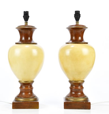 Lot 2244 - A pair of modern urn shaped table lamps on...