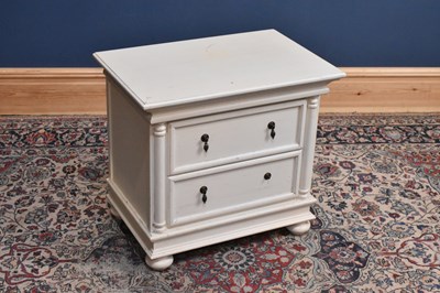 Lot 239 - A modern cream painted two drawer chest on bun...