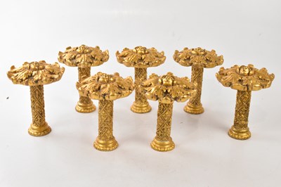 Lot 1092 - Seven modern gilt curtain tie backs.