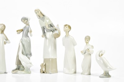 Lot 1421 - LLADRO; a collection of six ceramic figures...