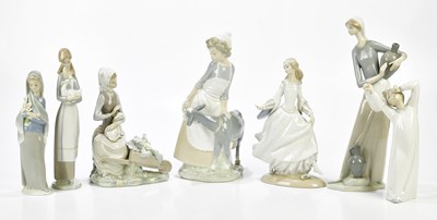 Lot 1422 - LLADRO; six figures including a water carrier,...