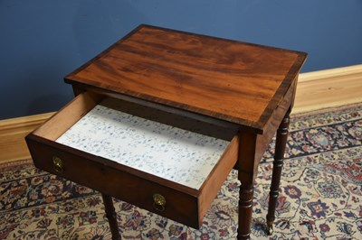 Lot 34 - A Regency mahogany and rosewood side table,...