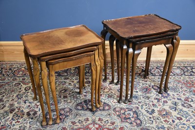 Lot 236 - Two walnut and beech nest of tables, each with...