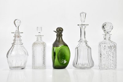 Lot 1479 - A group of four cut glass decanters, largest...