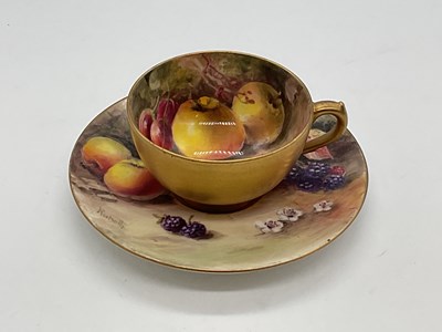 Lot 171 - ROYAL WORCESTER; a fruit painted cup and...