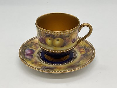 Lot 172 - ROYAL WORCESTER; a fruit painted cup and...