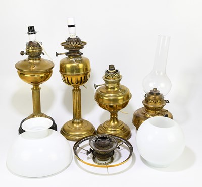 Lot 220 - Assorted lighting to include three brass oil...