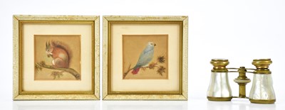 Lot 1069 - BR; a pair of hand painted miniatures of a...