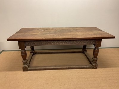 Lot 635 - An oak refectory table with plank top, height...