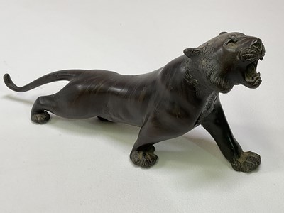 Lot 145 - Japanese Meij period bronze figure of a tiger,...