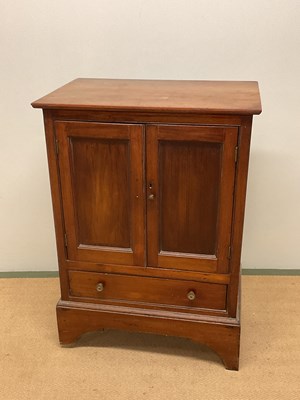 Lot 714 - A mahogany side cabinet with a single drawer...