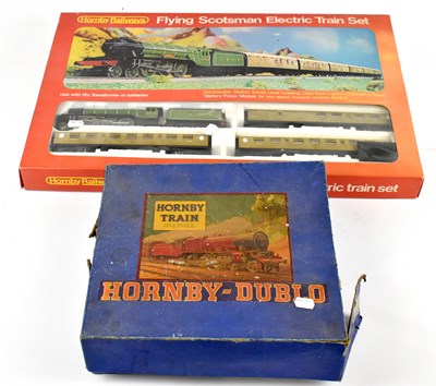 Lot 258 - HORNBY-DUBLO; a boxed train set with tin plate...