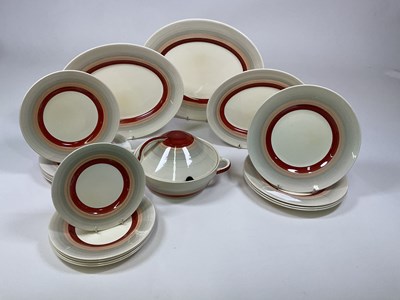 Lot 219 - SUSIE COOPER; a part dinner service in...