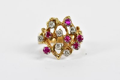 Lot 76 - A 14ct yellow gold diamond and ruby dress ring,...