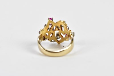 Lot 76 - A 14ct yellow gold diamond and ruby dress ring,...