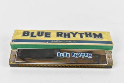 Lot 139 - Four cased harmonicas to include a super...