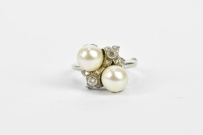 Lot 157 - A 14ct white gold diamond and pearl ring set...