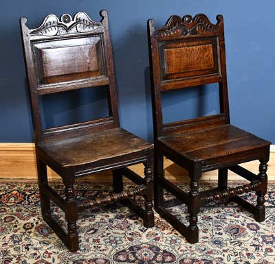 Lot 265 - A pair of oak back stools, circa 1700, with...