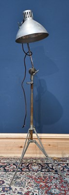 Lot 2201 - A mid 20th century tripod adjusting lamp,...