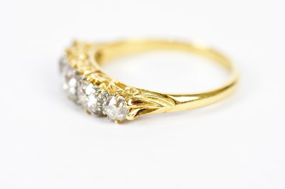 Lot 92 - An 18ct yellow gold five stone graduated...