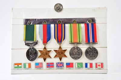 Lot 1559 - A medal group comprising of the War Medal, the...