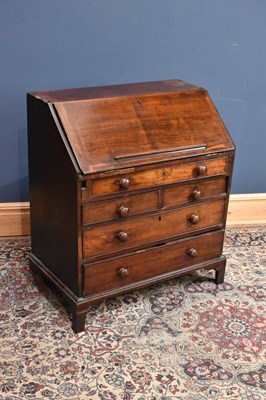 Lot 157 - A 19th century mahogany bureau with an...