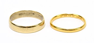 Lot 1105 - A 22ct yellow gold wedding band, approx. size...