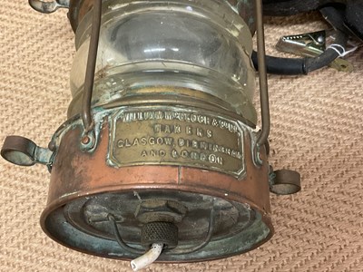 Lot 106 - A Naval Aldis lamp and a brass ship's mast light.