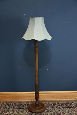 Lot 2224 - A beech standard lamp, height 154cm.