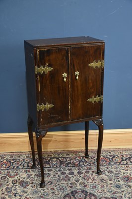 Lot 241 - A reproduction stained pine and brass mounted...