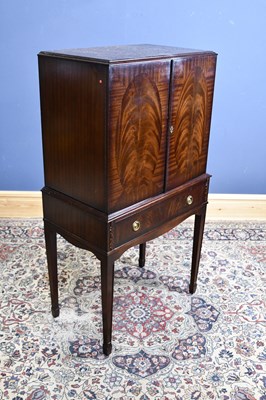 Lot 242 - A reproduction mahogany cocktail cabinet, with...