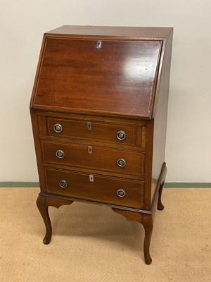 Lot 703 - An Edwardian bureau with inlay marquetry,...