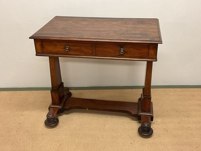 Lot 704 - A 19th century mahogany writing table with two...