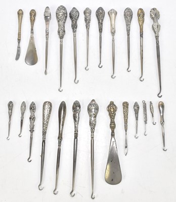 Lot 2545 - A quantity of silver handled button hooks and...
