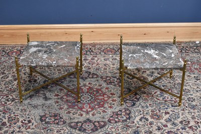 Lot 234 - A pair of brass and marble topped lamp tables,...