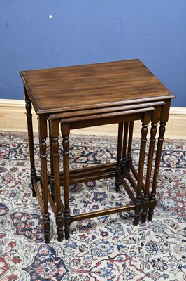 Lot 162 - A 19th century mahogany nest of three tables,...