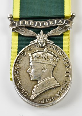 Lot 1568 - A George VI Territorial Efficiency Medal,...